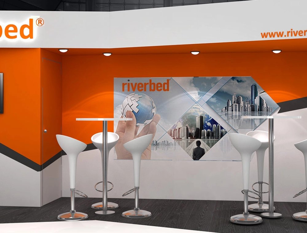 10x20 booth with seating and promotional graphics