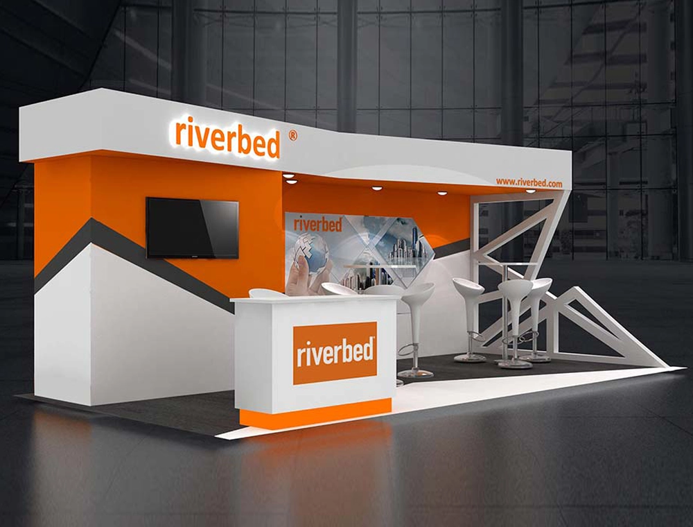 10x20 booth with seating and promotional graphics