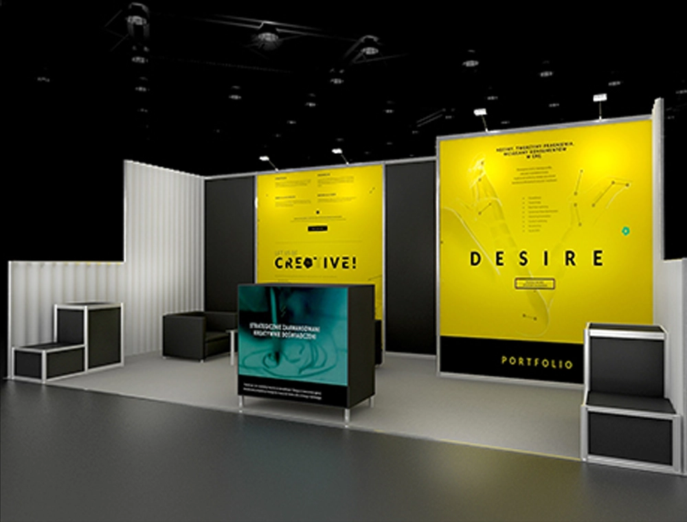 10x20 booth with digital screens and seating area