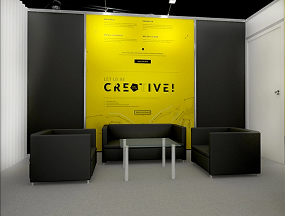 10x20 booth with digital screens and seating area