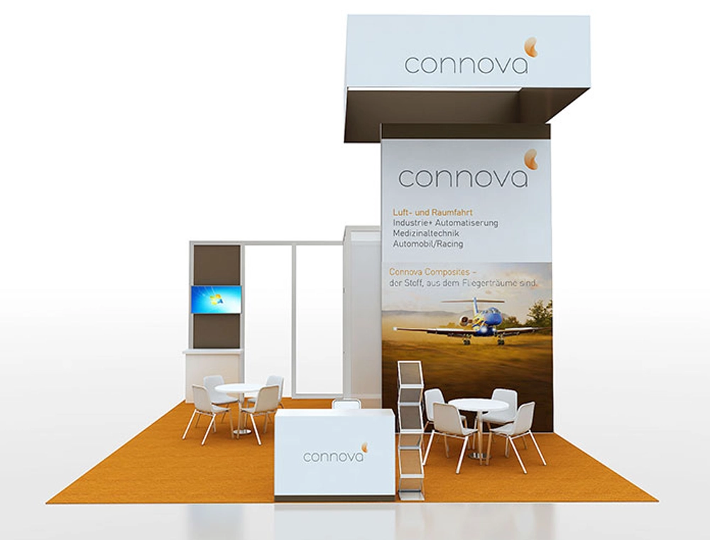 Trade show booth with open layout and branding