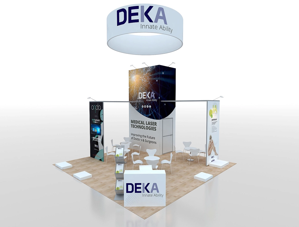 Spacious trade show booth with seating and signage