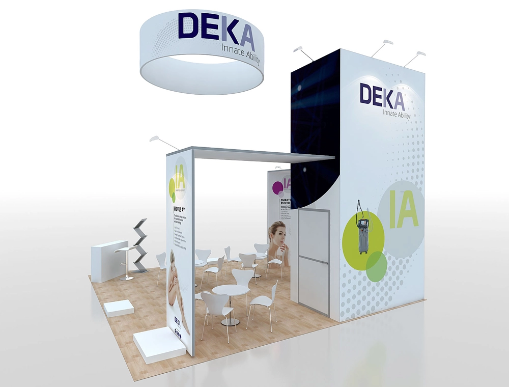 Spacious trade show booth with seating and signage