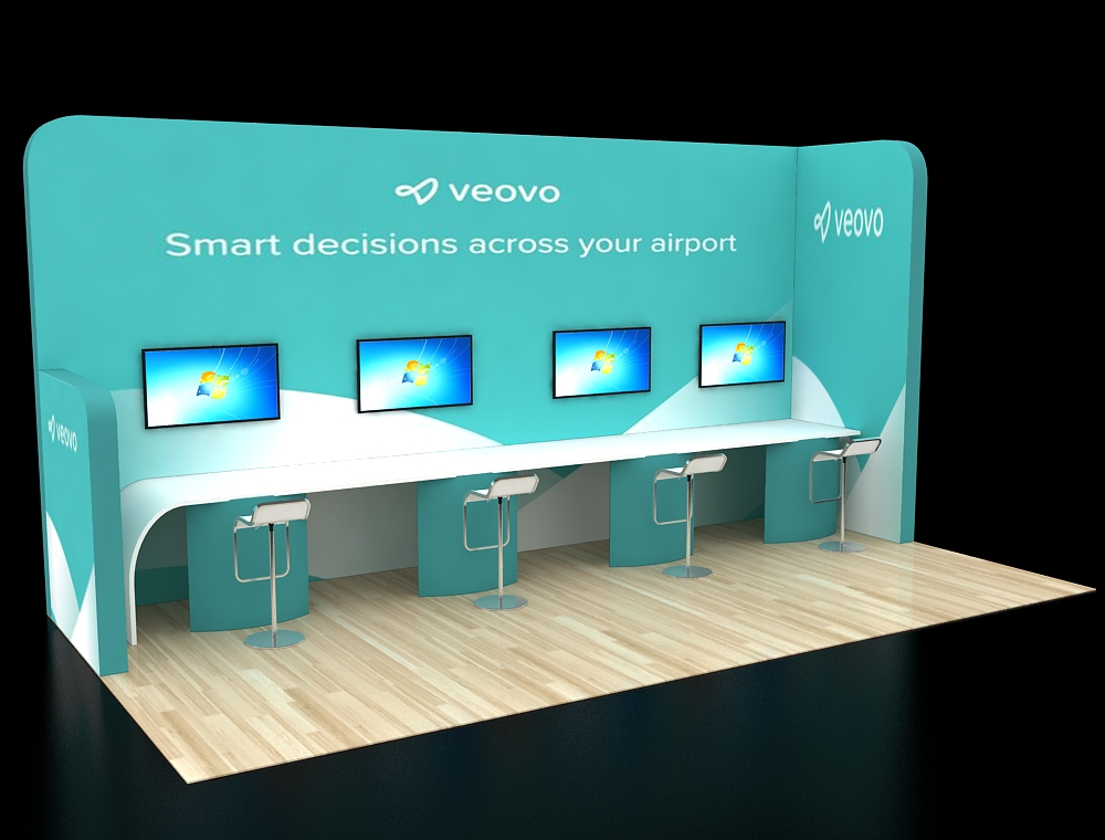 Open trade show booth with display stands