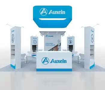 Large exhibition booth with vibrant graphics and counters